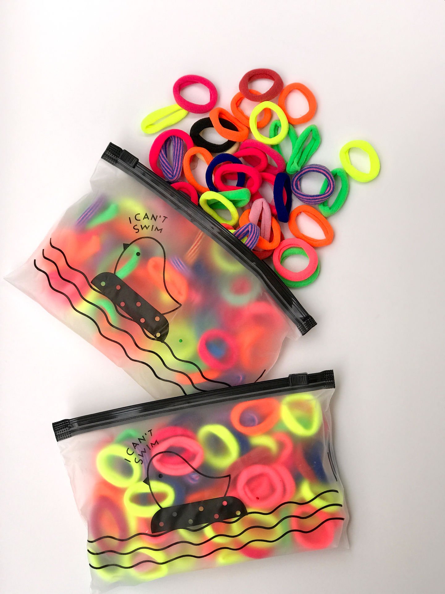 100lü çantalı mini lastik toka.