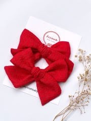 Büyük boy kırmızı kendinden desenli fiyonk klips toka.